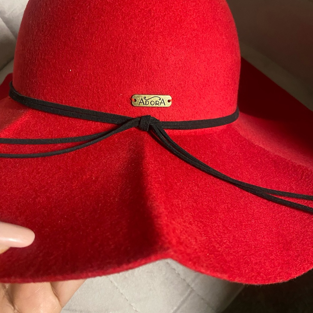 Adora red wool hat. One size very stylish, and sophisticated. New with tag.